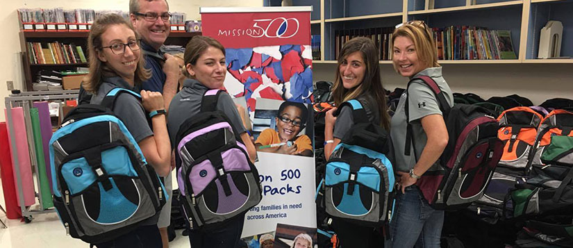 Security Professionals Help Prepare Children for School at Mission 500’s Florida Backpack Event